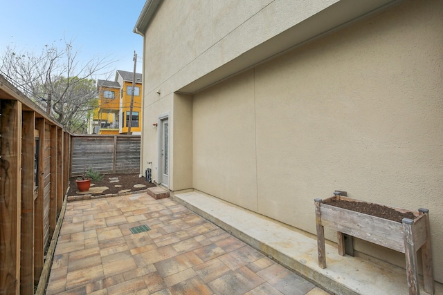 view of patio / terrace with fence