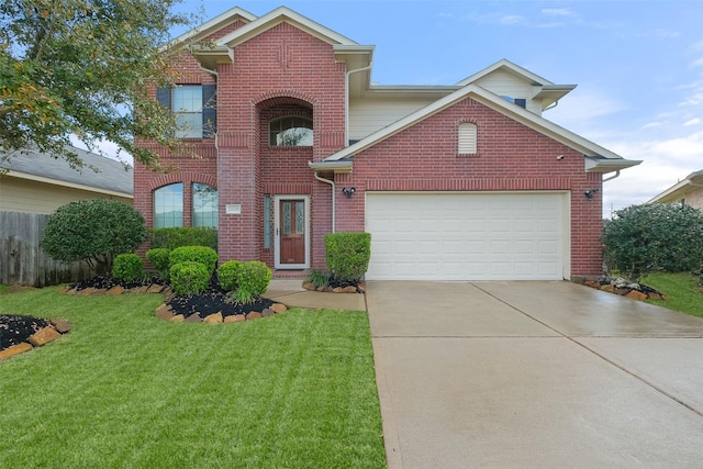 traditional home featuring brick siding, a garage, driveway, and a front yard