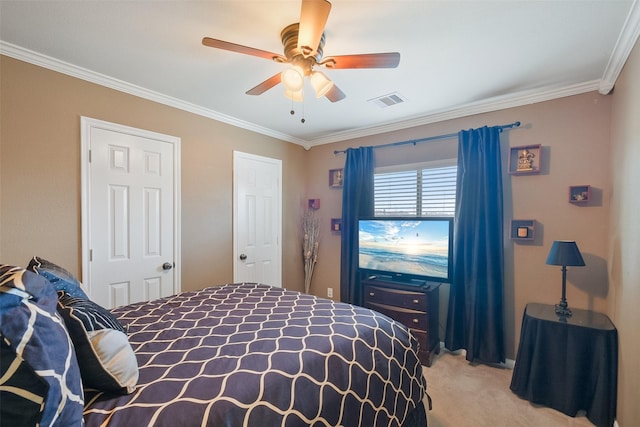 bedroom with a ceiling fan, light colored carpet, visible vents, and ornamental molding