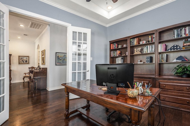 office with visible vents, baseboards, dark wood-type flooring, and ceiling fan