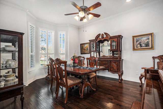 dining area featuring dark wood-style floors, a ceiling fan, and ornamental molding