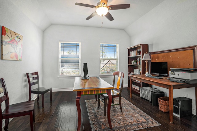 office space featuring vaulted ceiling, hardwood / wood-style flooring, baseboards, and ceiling fan