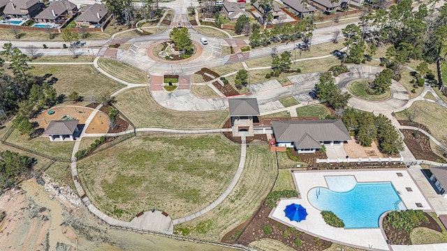 birds eye view of property with a residential view