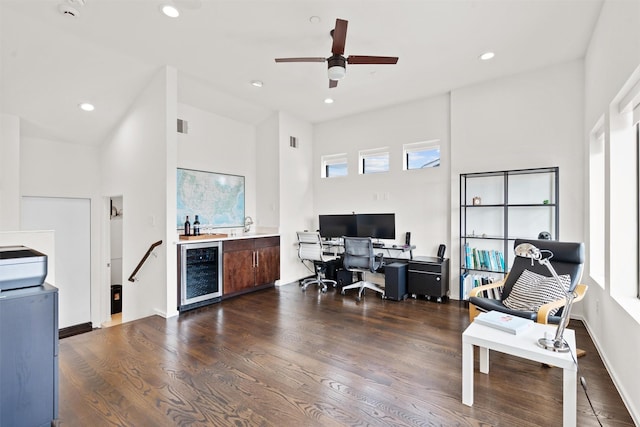 office with visible vents, beverage cooler, dark wood-style floors, recessed lighting, and ceiling fan