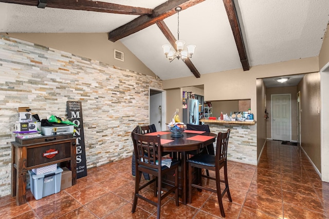 tiled dining space with an inviting chandelier, vaulted ceiling with beams, visible vents, and a textured ceiling