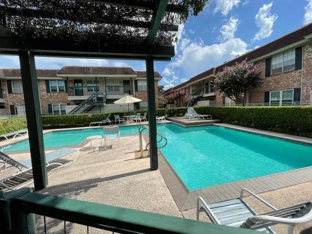 pool with a patio