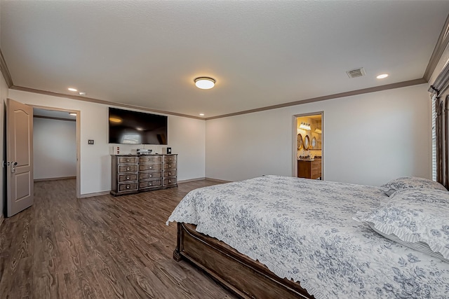 bedroom with dark wood-style floors, baseboards, visible vents, recessed lighting, and ornamental molding