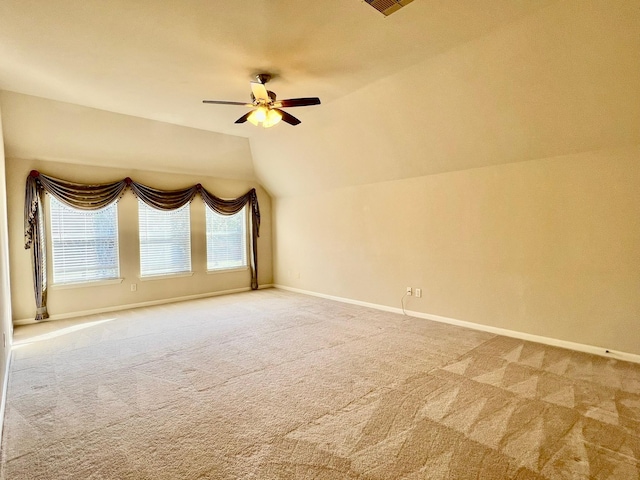 bonus room featuring baseboards, carpet, ceiling fan, and vaulted ceiling