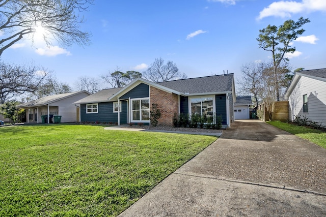 view of front of property with a garage, concrete driveway, a front yard, and roof with shingles