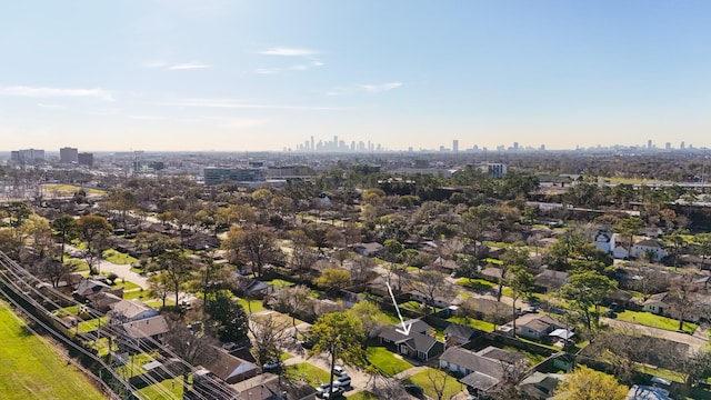 birds eye view of property with a city view