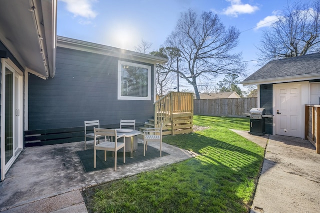 view of yard featuring a patio area and fence