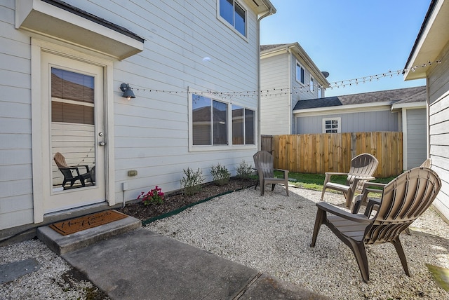 view of patio / terrace featuring fence