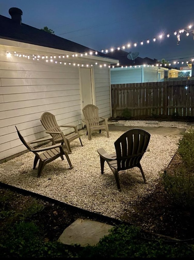 patio at twilight with fence