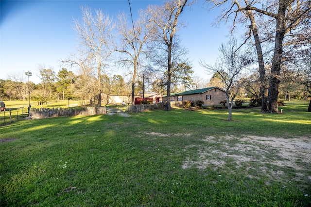 view of yard with fence