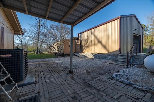 exterior space featuring central air condition unit