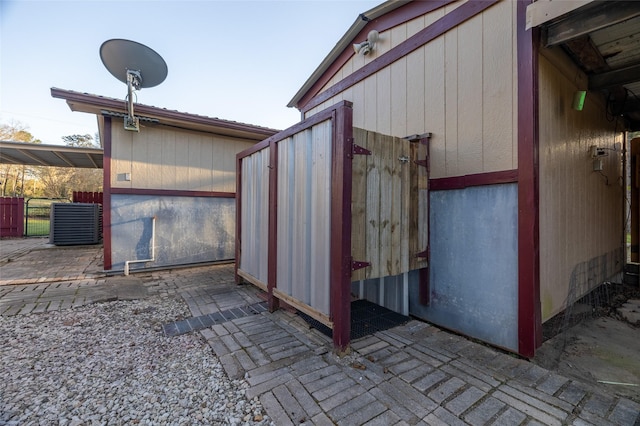 view of outbuilding with fence