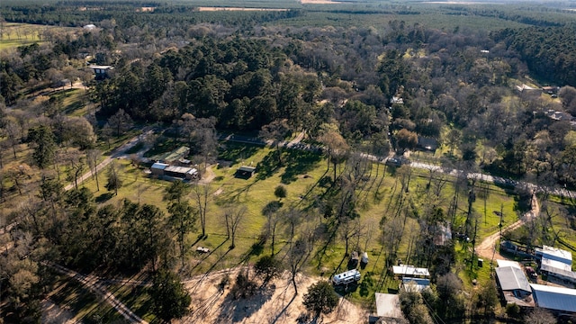 aerial view with a wooded view