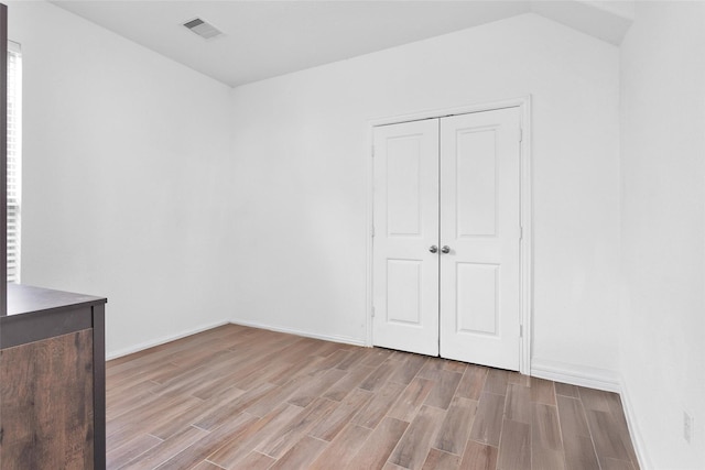 118 Emory Birch Dr, Montgomery, TX 77316 - interior space with baseboards, light wood-style floors, and visible vents