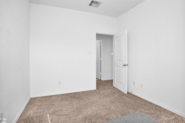 118 Emory Birch Dr, Montgomery, TX 77316 - spare room featuring carpet floors, visible vents, and baseboards