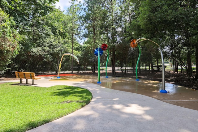 118 Emory Birch Dr, Montgomery, TX 77316 - community play area featuring a yard
