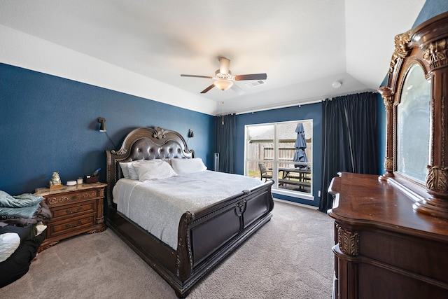 carpeted bedroom featuring access to exterior, visible vents, and ceiling fan