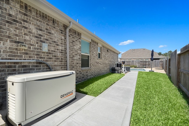 view of yard featuring a fenced in pool and a fenced backyard