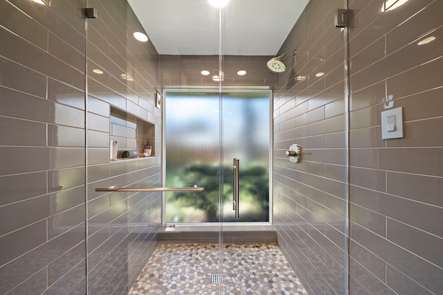 bathroom featuring a stall shower