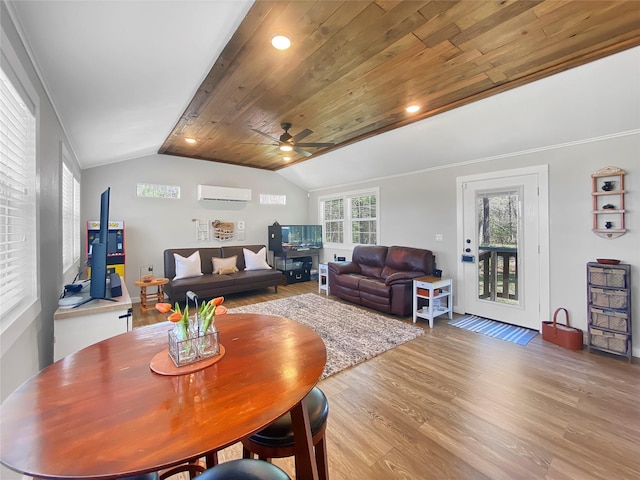 dining area featuring light wood finished floors, lofted ceiling, ceiling fan, wood ceiling, and a wall mounted air conditioner