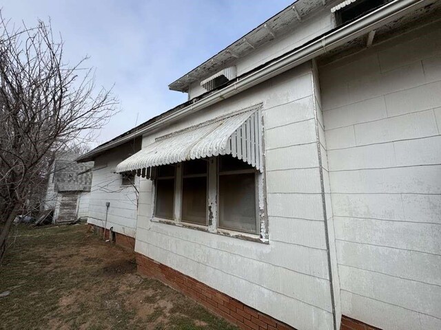 view of property exterior featuring crawl space