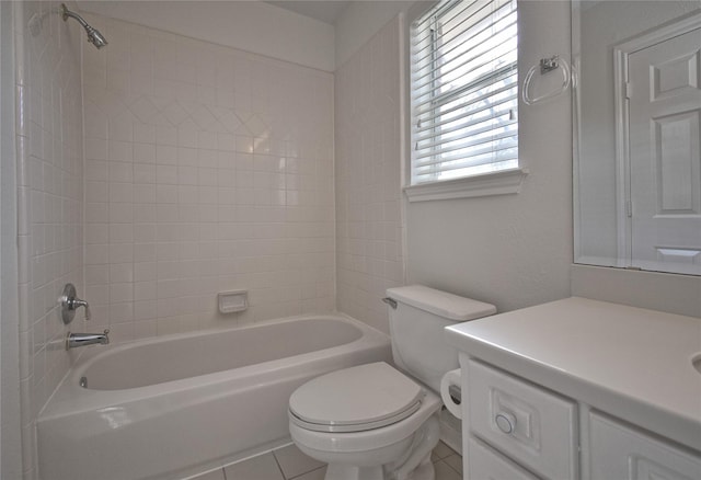 bathroom with tile patterned flooring, shower / bathing tub combination, toilet, and vanity