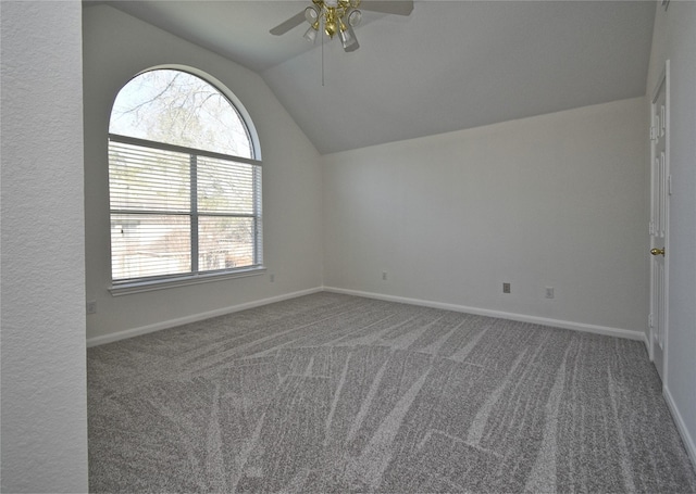 bonus room featuring lofted ceiling, baseboards, carpet floors, and ceiling fan