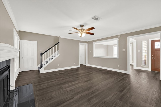 unfurnished living room with stairway, visible vents, a fireplace with flush hearth, ceiling fan, and dark wood-type flooring