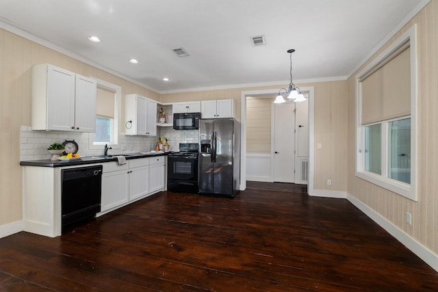 kitchen with black appliances, dark countertops, visible vents, and open shelves