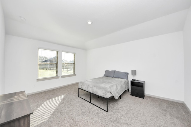 carpeted bedroom with recessed lighting and baseboards