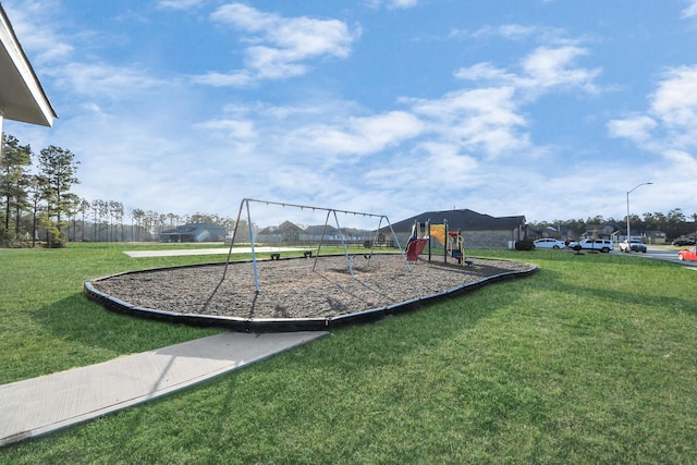 communal playground with a lawn