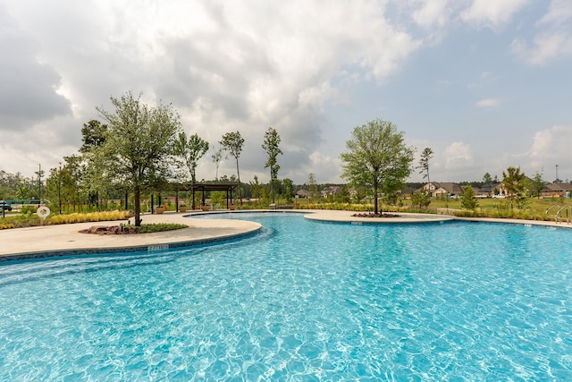 16178 Rustling Woods Rd, Conroe, TX 77302 - community pool with a pergola