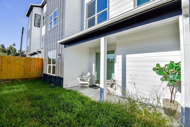 property entrance with fence