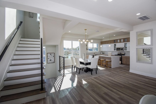 dining space featuring visible vents, stairway, recessed lighting, an inviting chandelier, and dark wood-style flooring