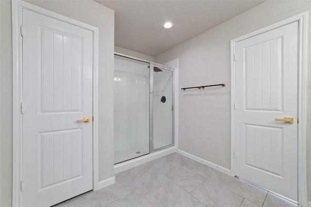 full bath featuring tile patterned flooring, a shower stall, recessed lighting, and baseboards