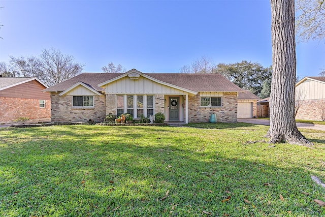 single story home featuring brick siding, a front yard, a garage, and roof with shingles