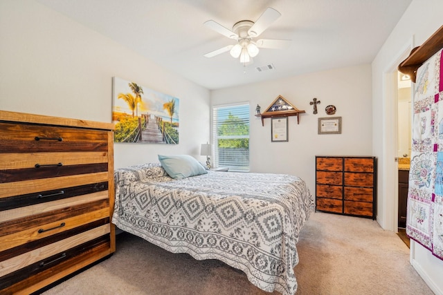 bedroom featuring visible vents, carpet flooring, and a ceiling fan