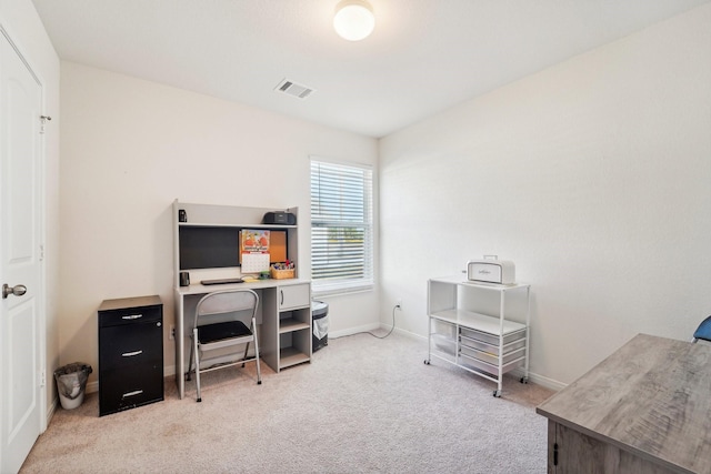 home office featuring baseboards, visible vents, and carpet floors