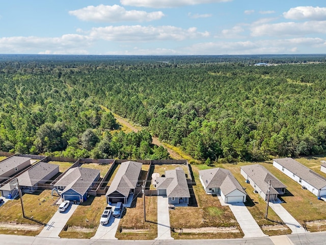 bird's eye view with a residential view and a view of trees