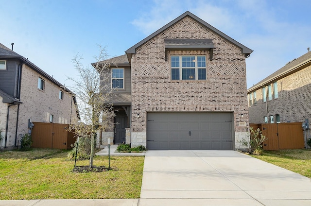 traditional-style house featuring concrete driveway, brick siding, a garage, and a front yard