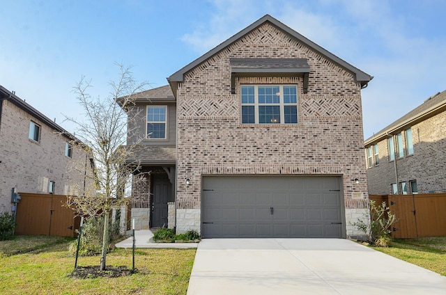 view of front of home with driveway, brick siding, an attached garage, and fence