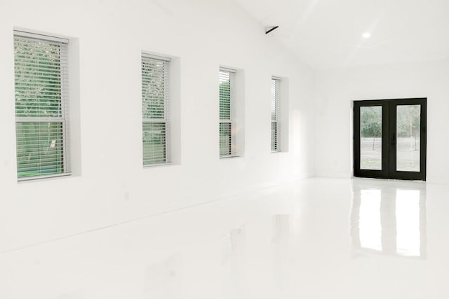 interior space with french doors and lofted ceiling