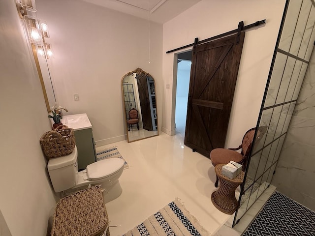 full bath featuring baseboards, toilet, walk in shower, and vanity