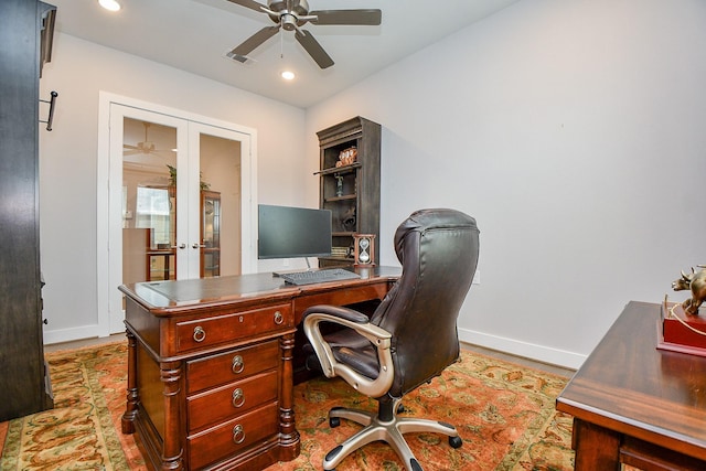 office space featuring visible vents, french doors, baseboards, and a ceiling fan