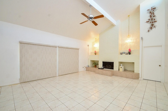 unfurnished living room featuring a ceiling fan, high vaulted ceiling, beam ceiling, light tile patterned flooring, and a tile fireplace