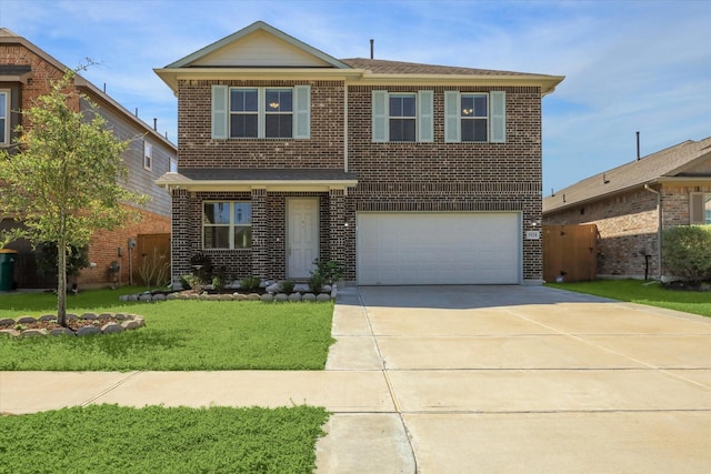 traditional-style house featuring a front yard, an attached garage, brick siding, and driveway